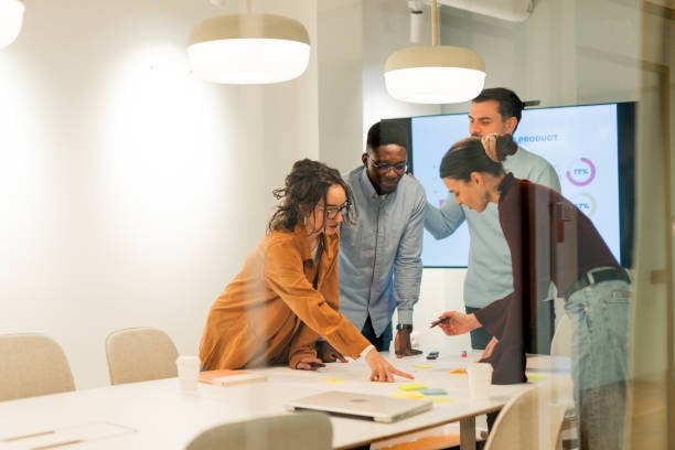 Branding team reviewing design concepts together around a table